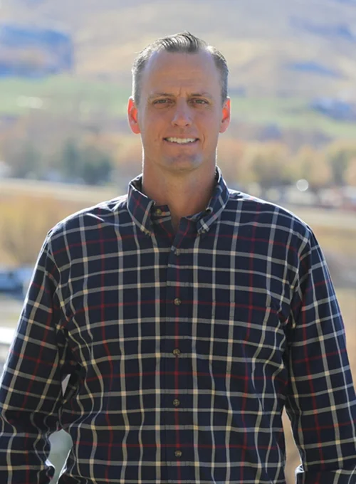 Dentist Leo Christensen standing outside
